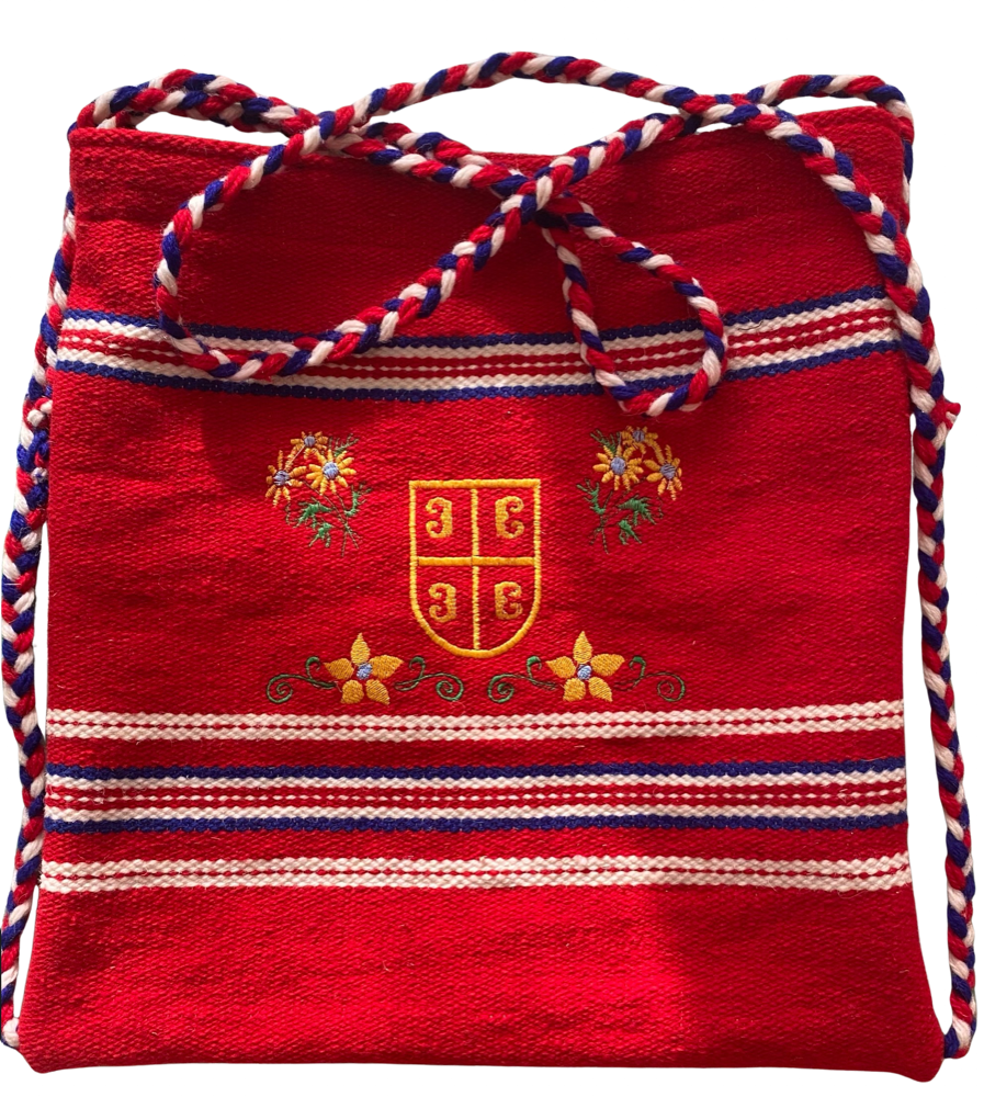 Crvena ručno tkana torba sa izvezenim grbom